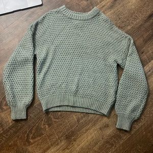 small green sweater